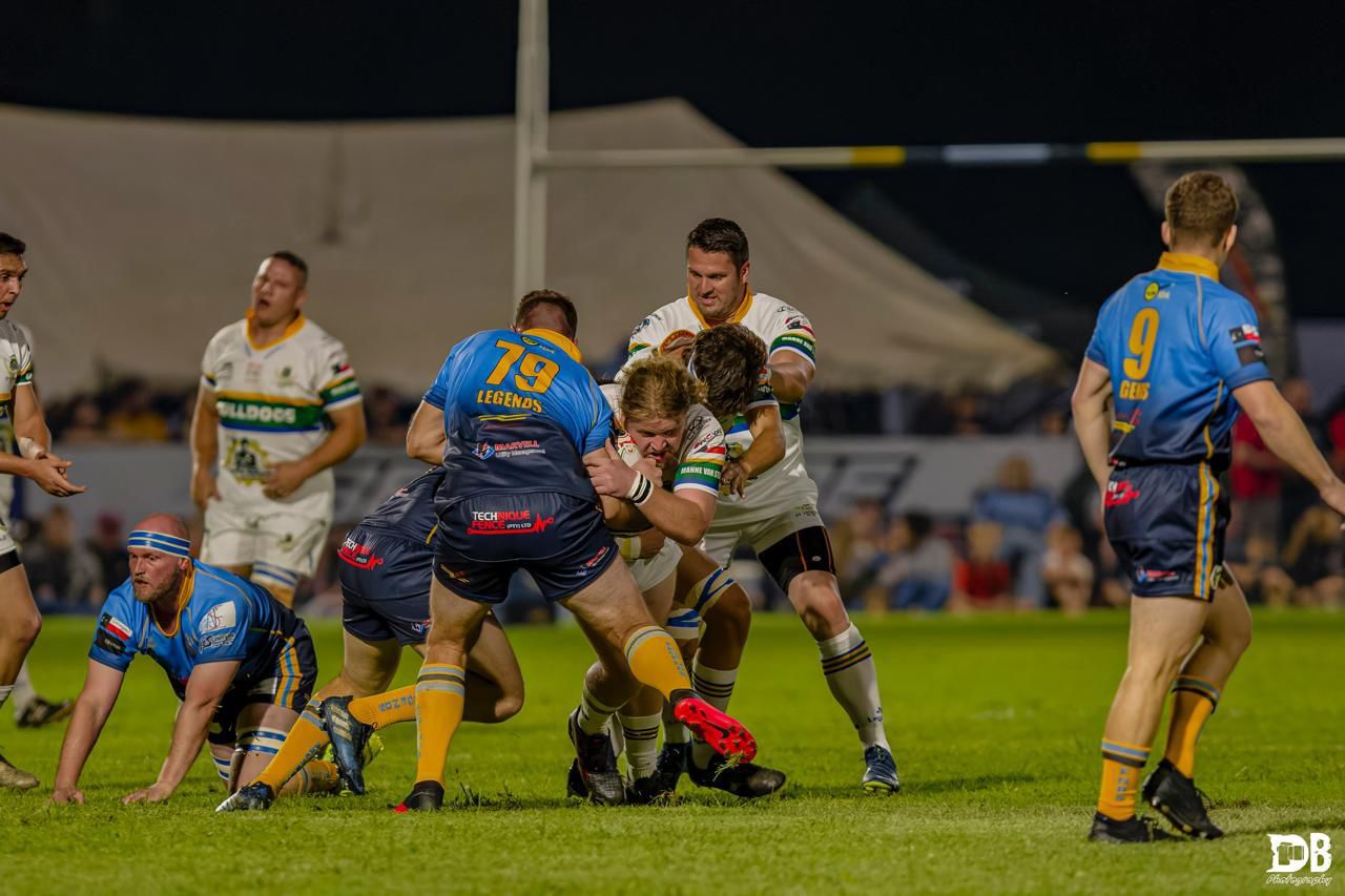 Rugby tackle action shot